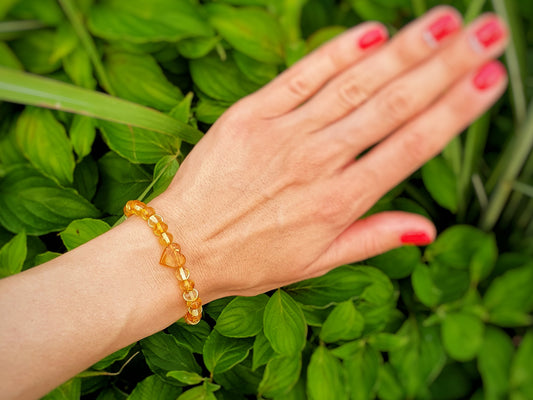 light amber bracelet with heart pendant