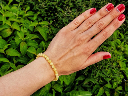 white amber adult bracelet with elastic band