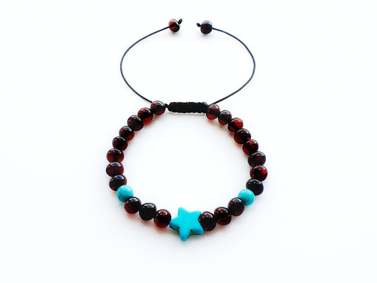 handmade amber bracelet with blue turquoise star