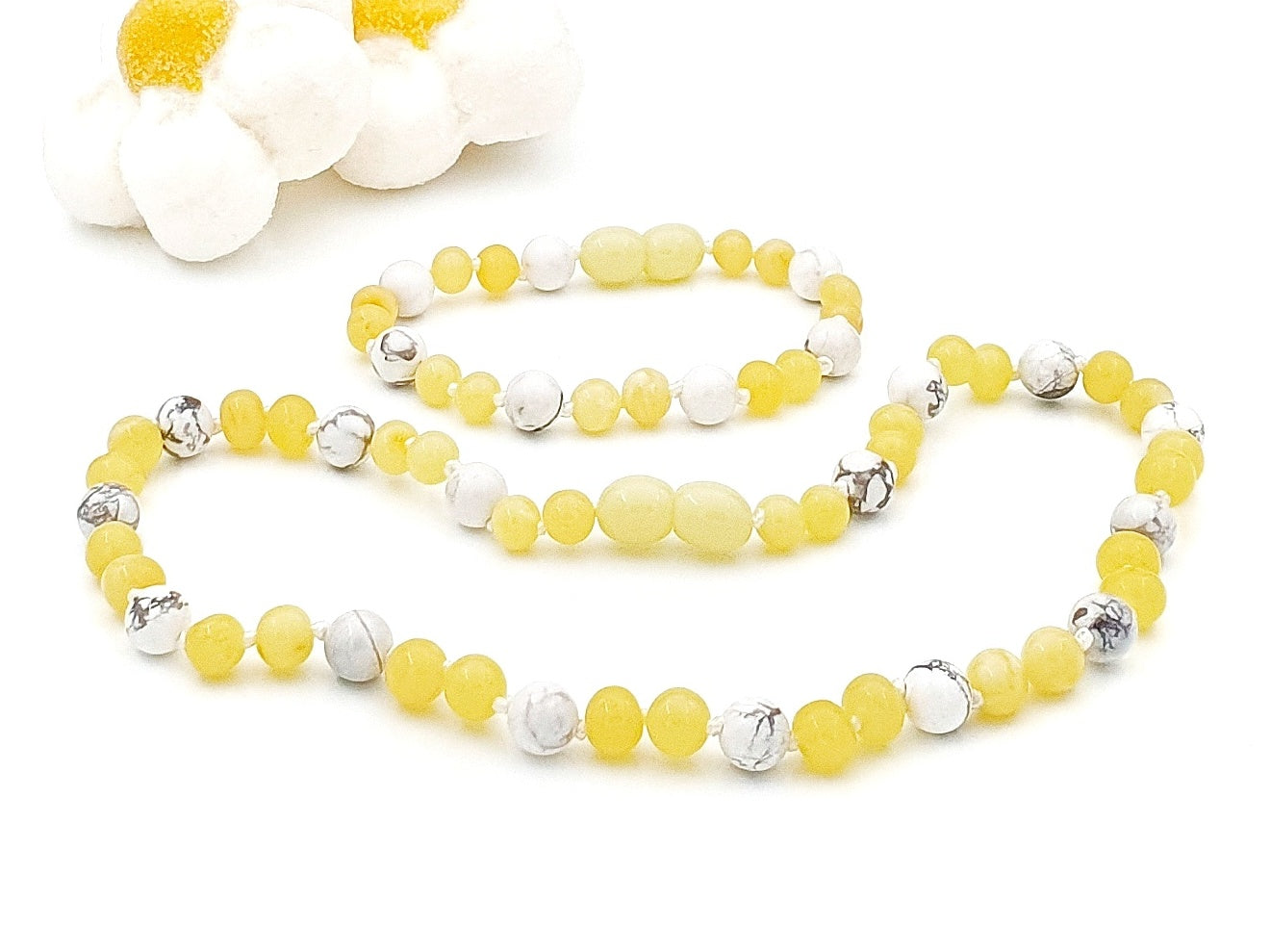 white Baltic amber jewelry with howlite stones