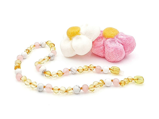 amber baby jewelry with pink quartz and white howlite stones