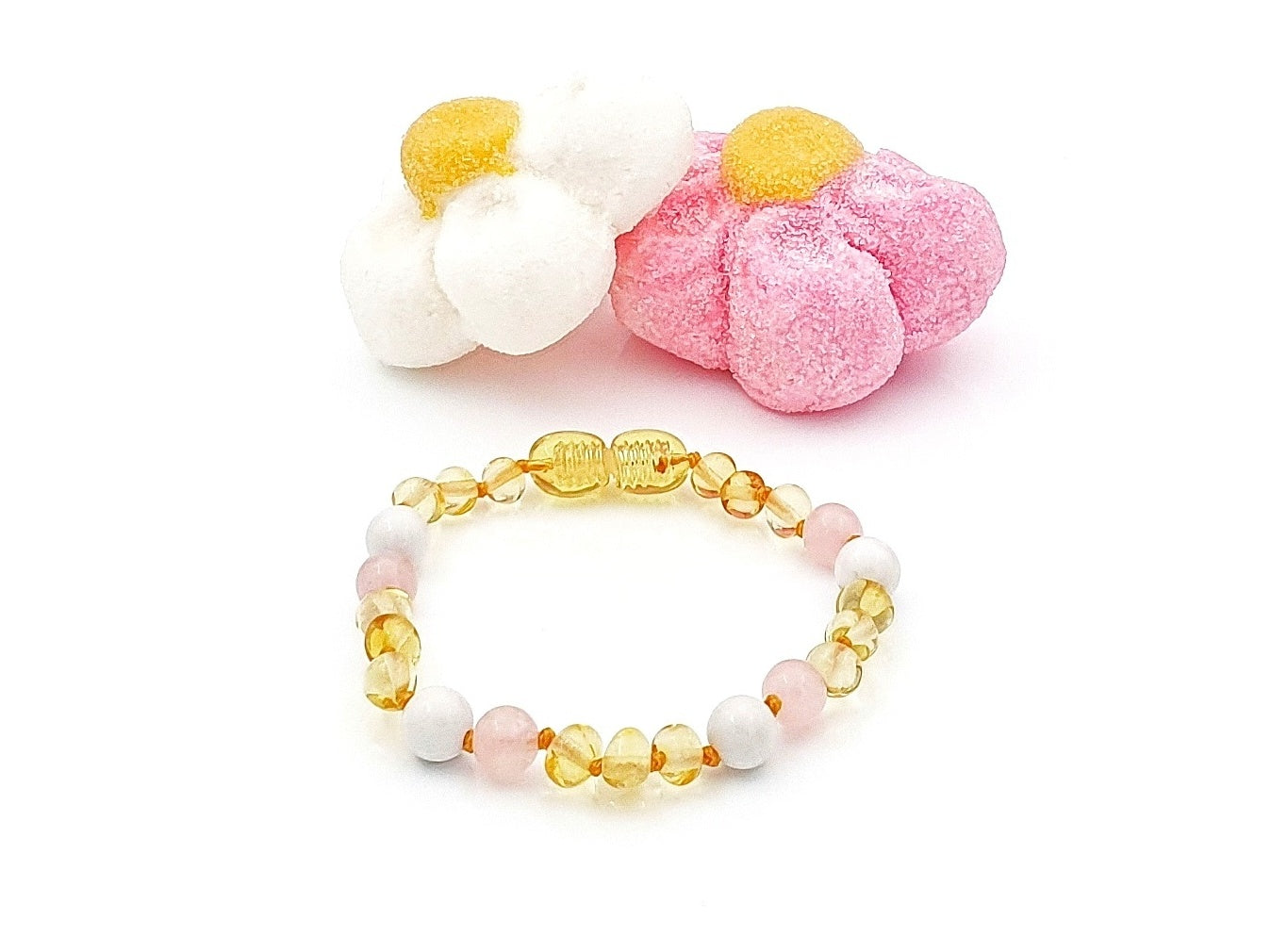 Amber baby bracelet with pink quartz