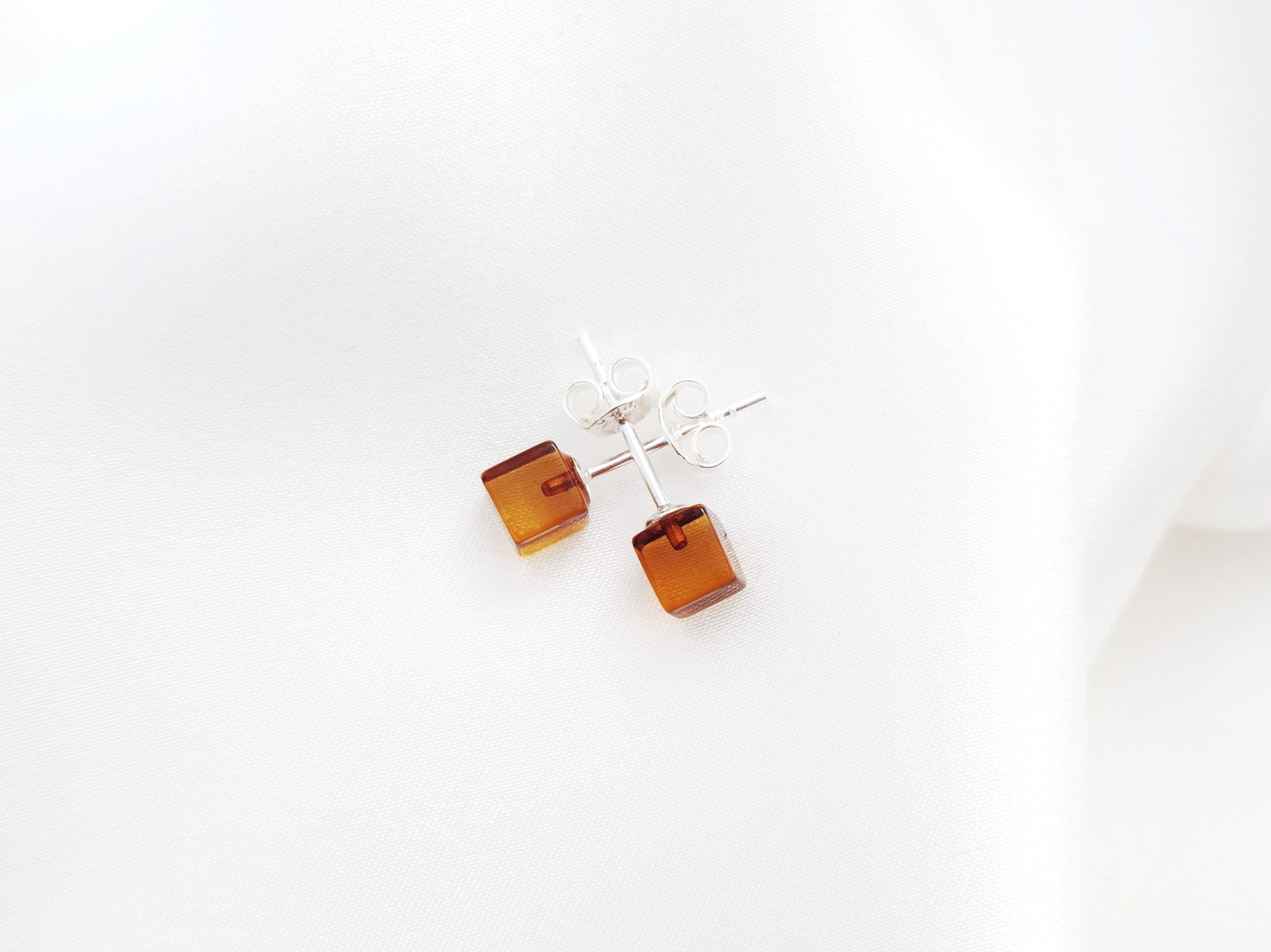 Cognac cube amber stud earrings with 925 silver