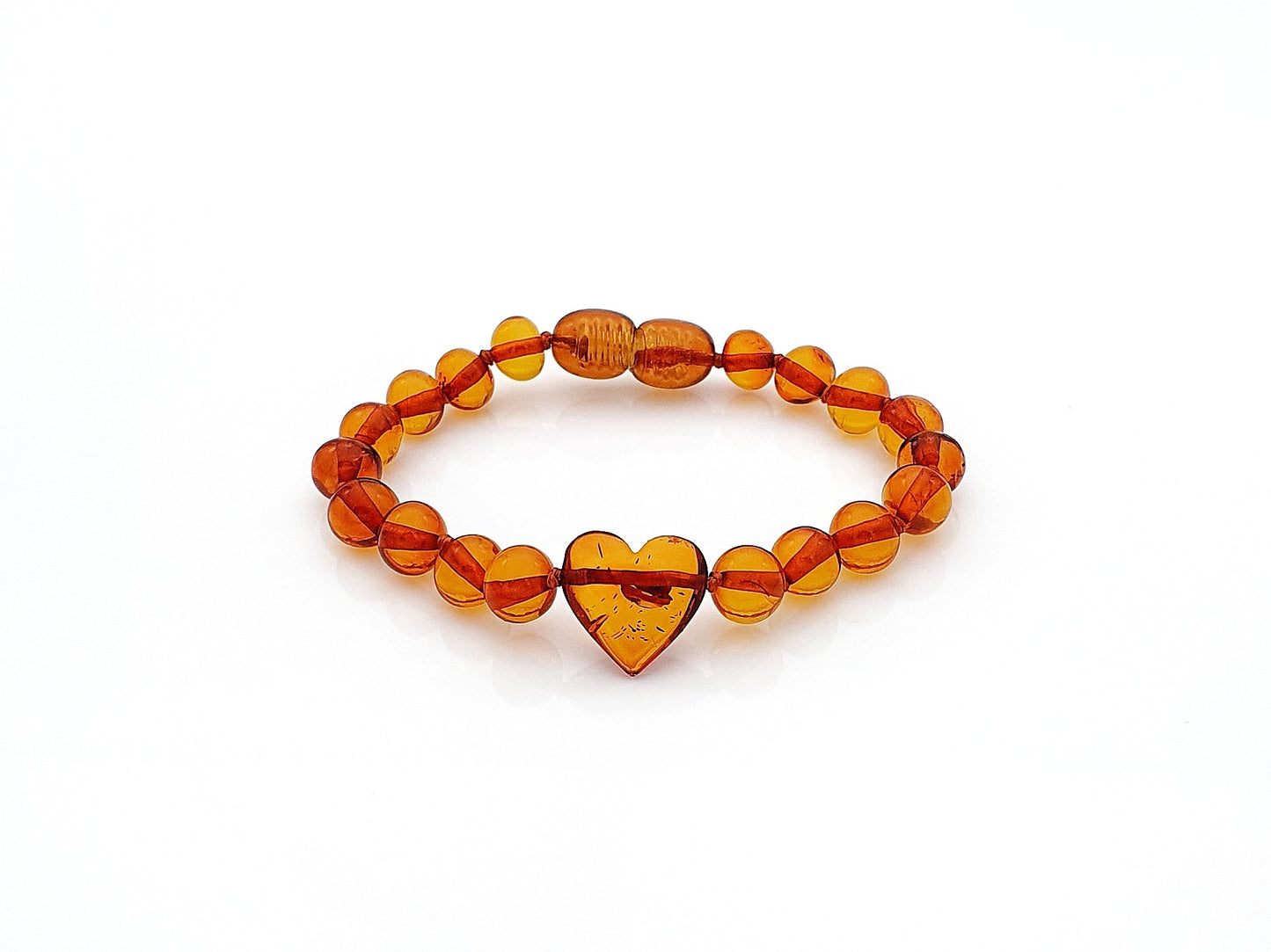 cognac color amber bracelet with heart