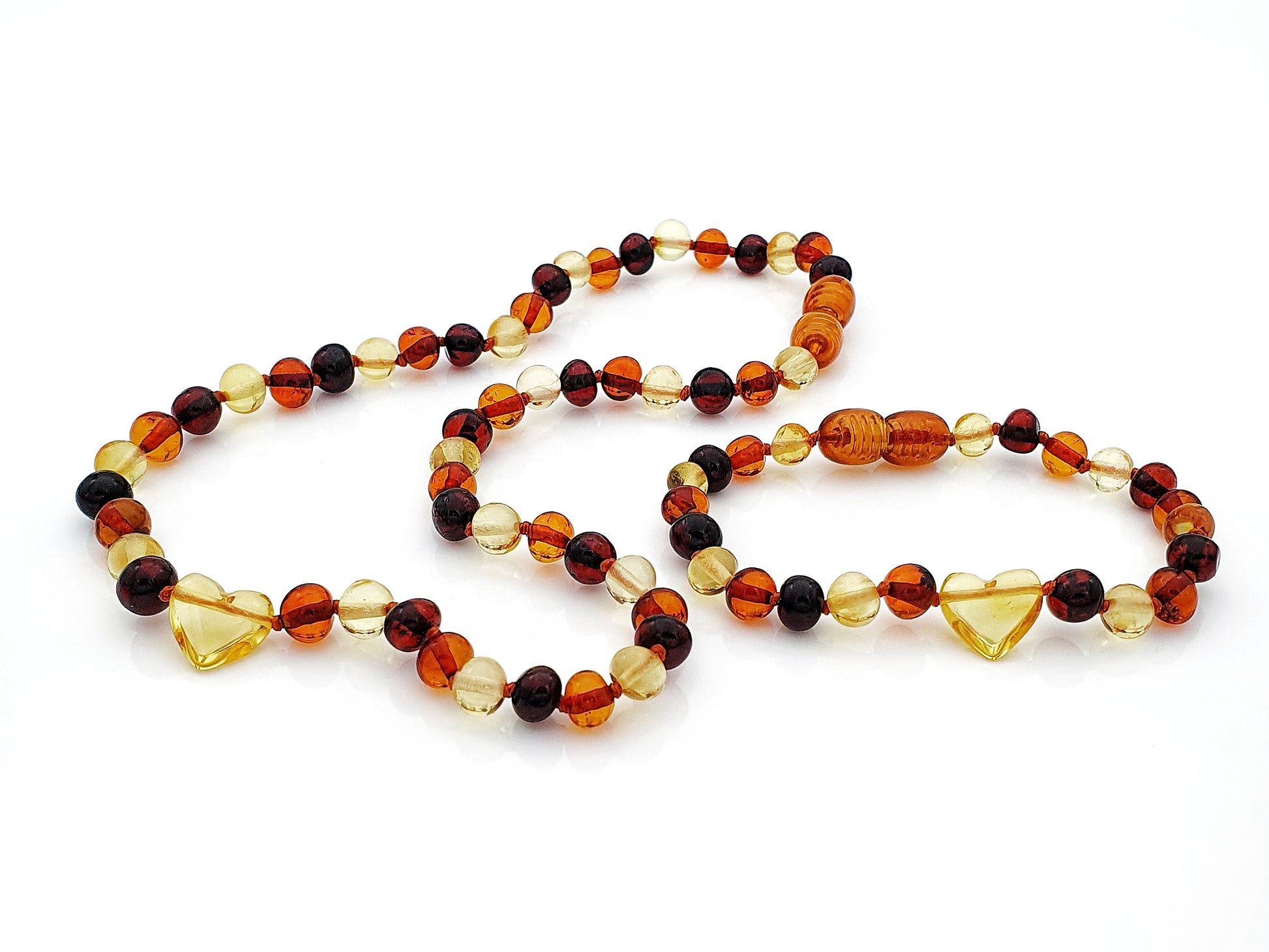 Baltic amber with amber heart pendant