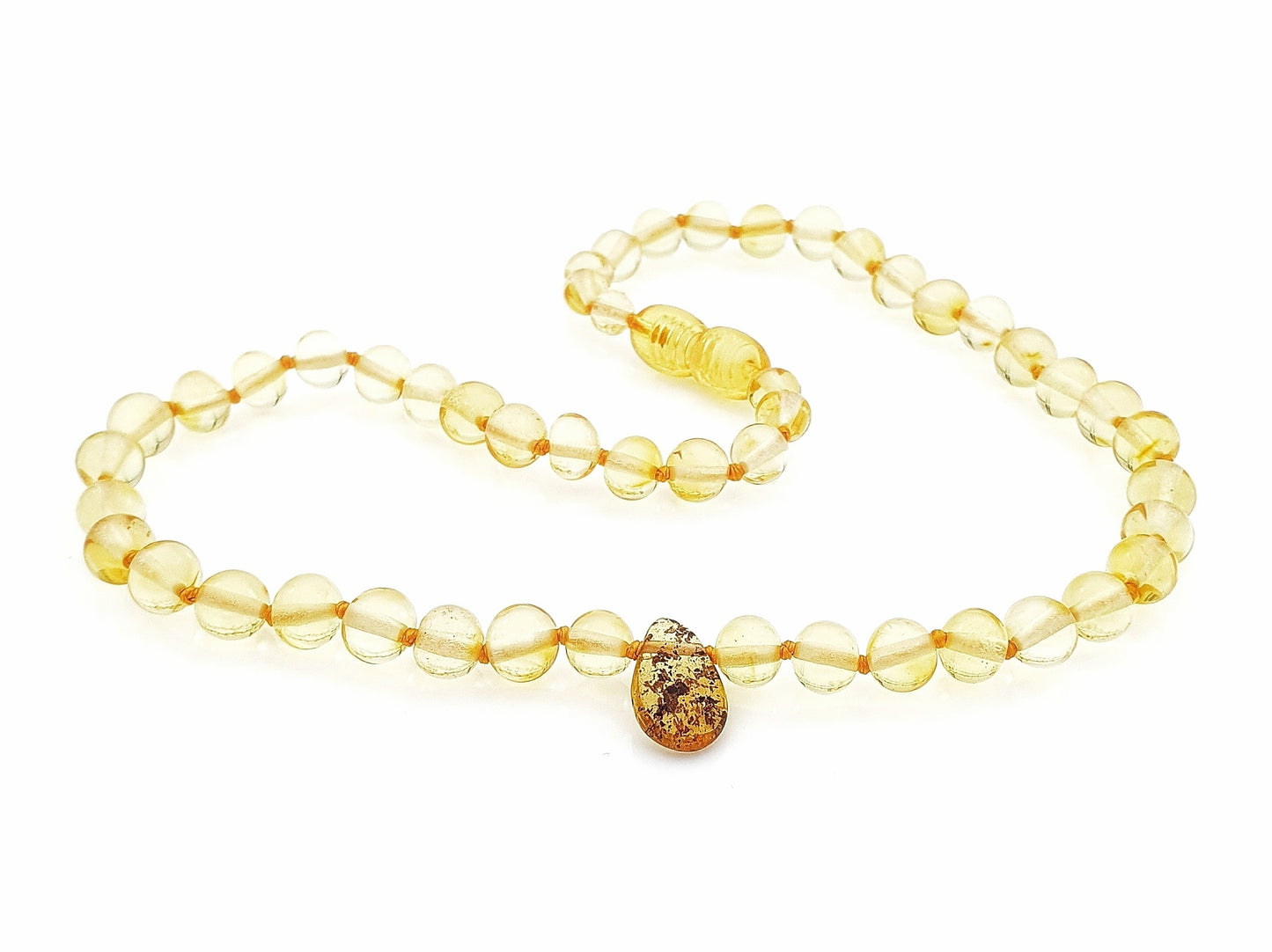 polished original Baltic amber baby jewelry
