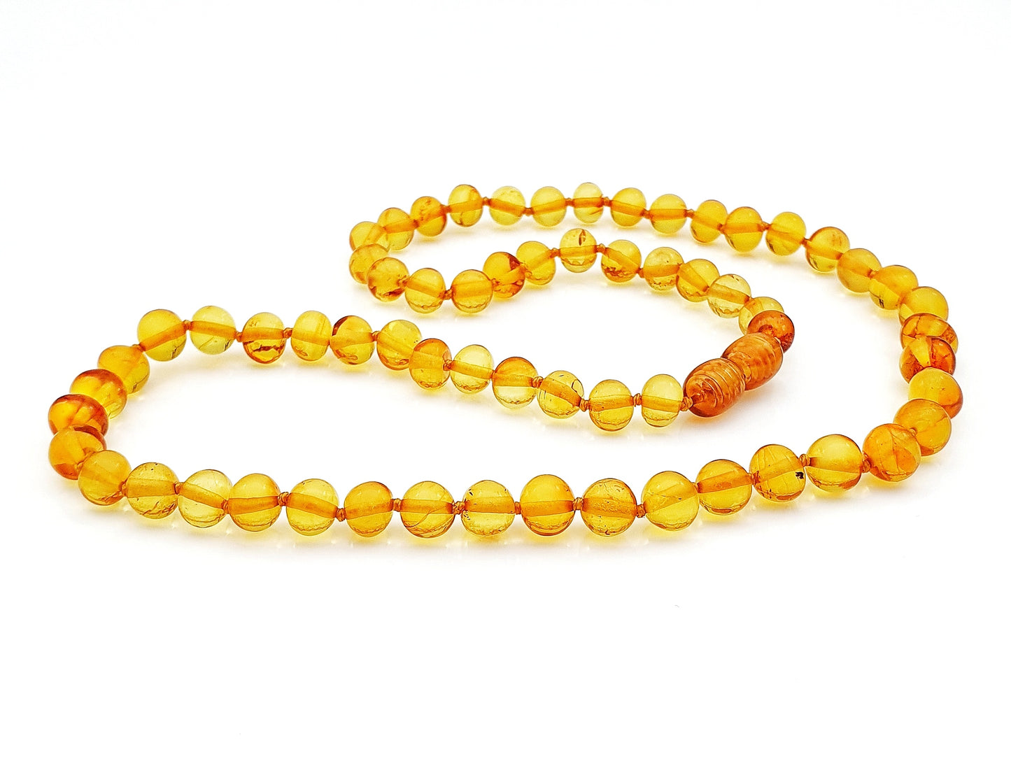 handcrafted polished Baltic amber round beads