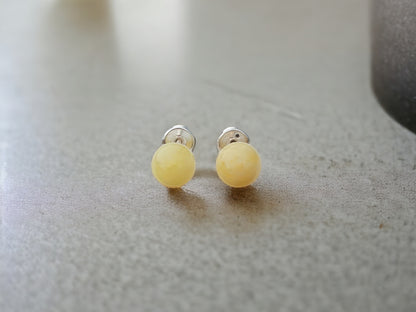 round white amber stud earrings