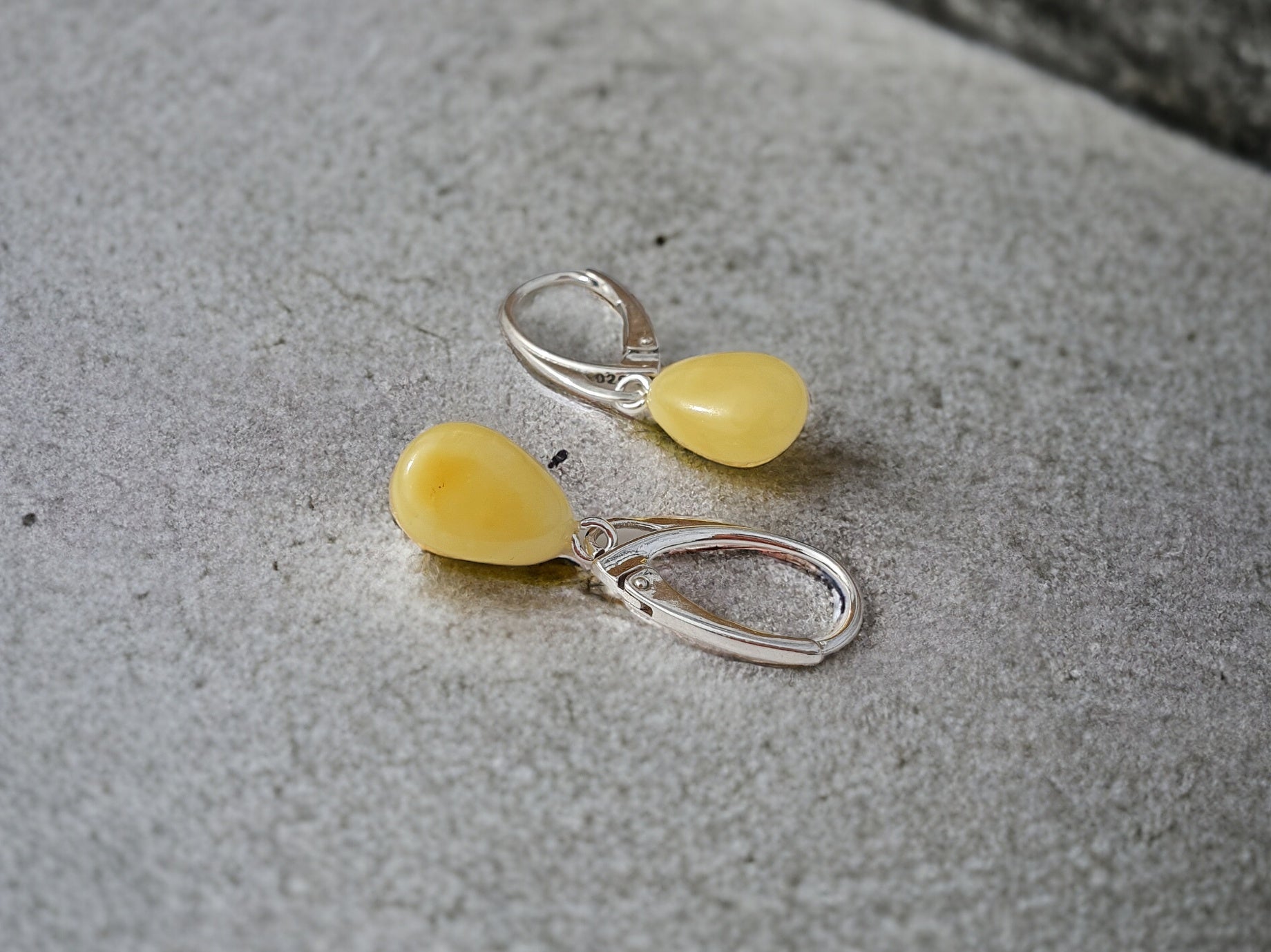 White color Baltic amber earrings