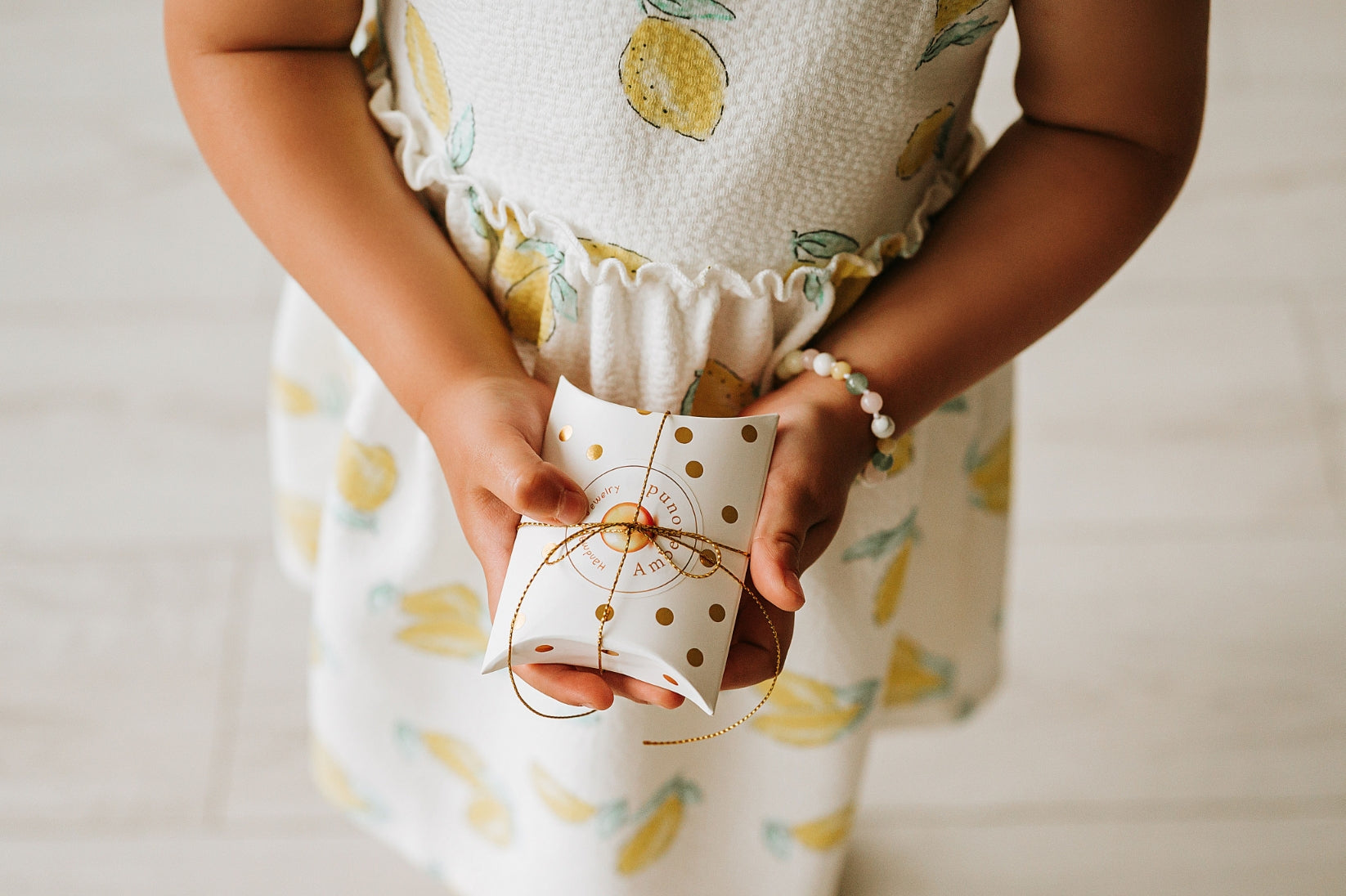 minimalist amber baby jewelry package