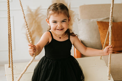 Handmade amber teething necklace with heart pendant